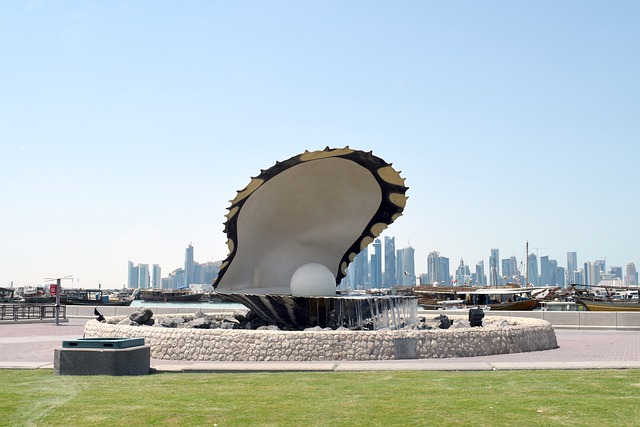 Day view of Doha corniche Pearl monument
