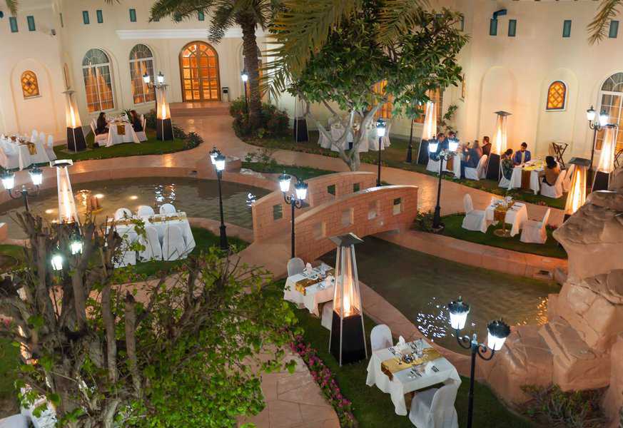 Nassayem Qatar dining area with canal running in center