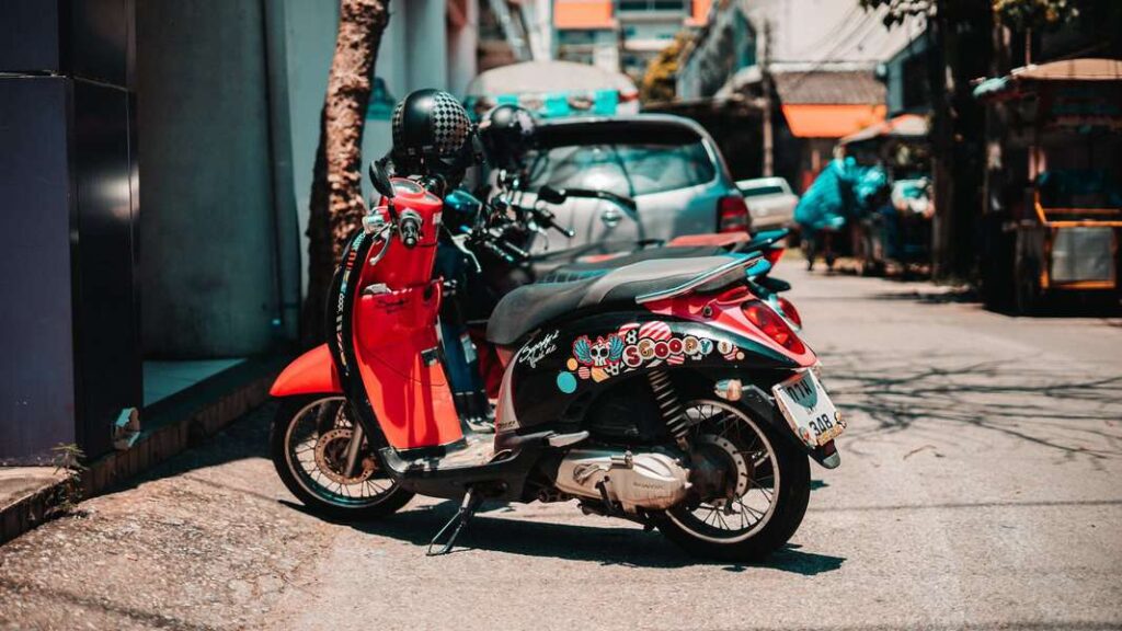 a scooter bike parked outside