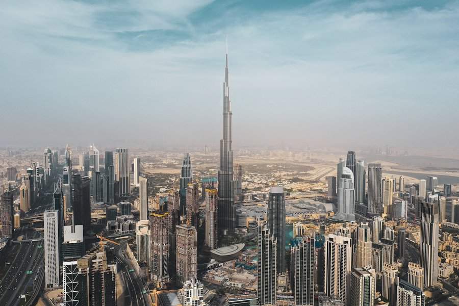 Complete aerial view of Dubai city center with full view of Burj Khalifa