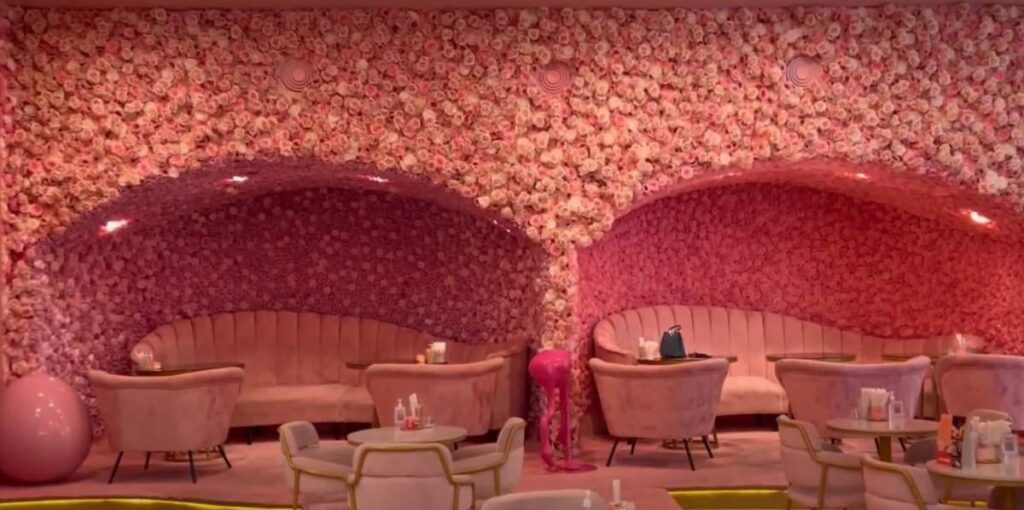 Beautiful pink flower settings inside the amora cafe Doha