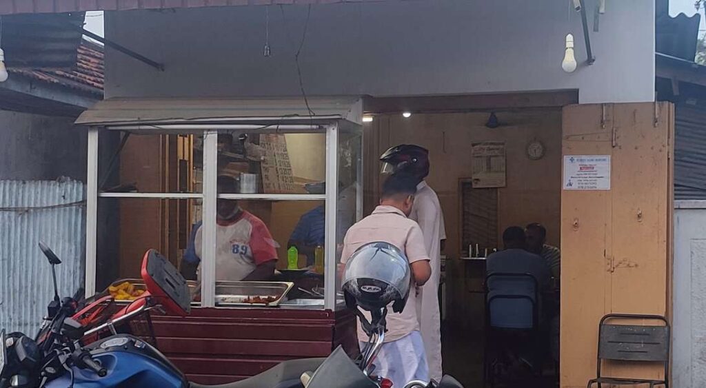 Locals buying evening meal in Ansar nana shop