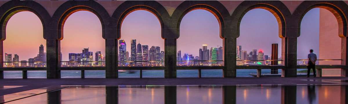 A man viewing the Doha city from Museum of Islamic Art