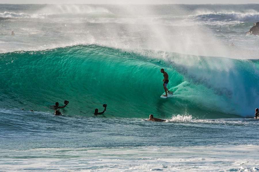 surfer surfing on a big wave