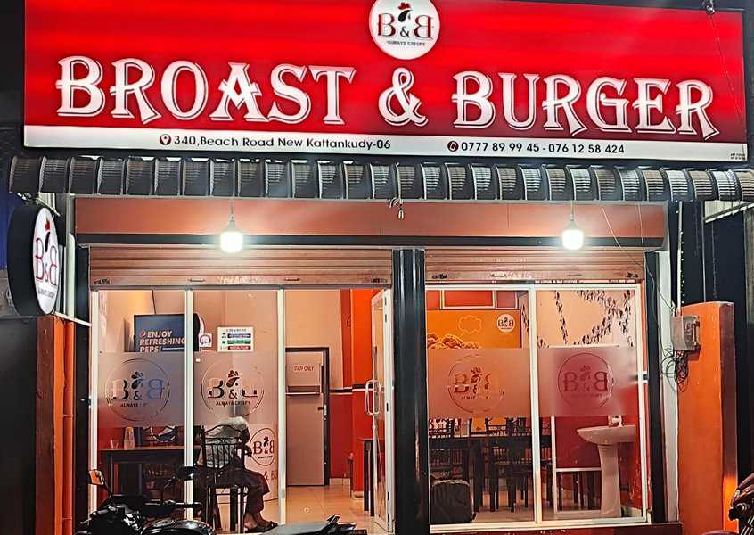 Broast and Burger shop front view at night