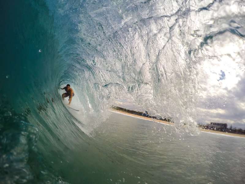 A man surfing through a spiral wave