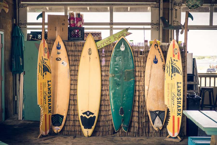 Unique colorful surfing boards put on a display in a shop