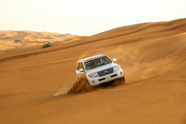 A jeep riding in a desert safari