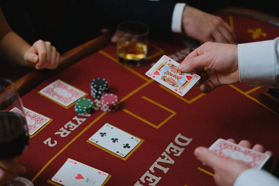  A Poker game is played in a Casino