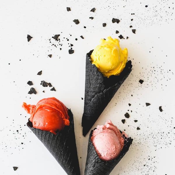 Scoopi Dubai's unique charcoal waffle cone ice creams