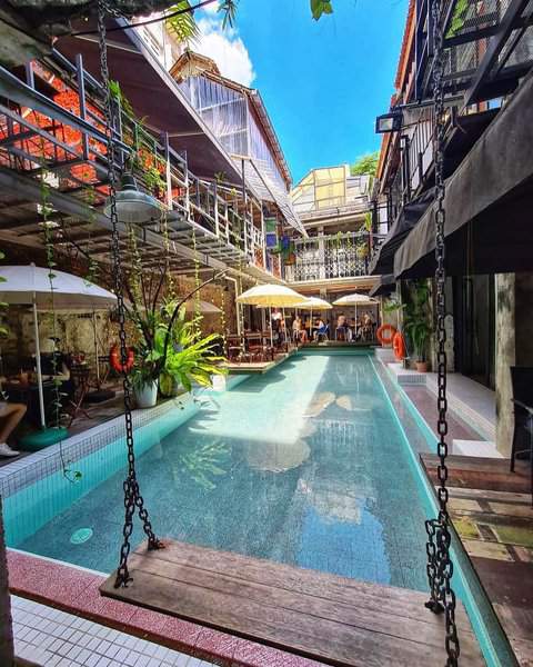 the swimming and the swing inside the Kafe Kleptokrat in KL